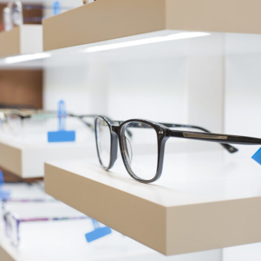 glasses on a shelf in a store glasses on a shelf in a store