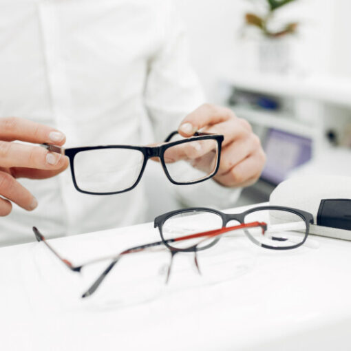 Man in a glasses. Guy in a optics shop